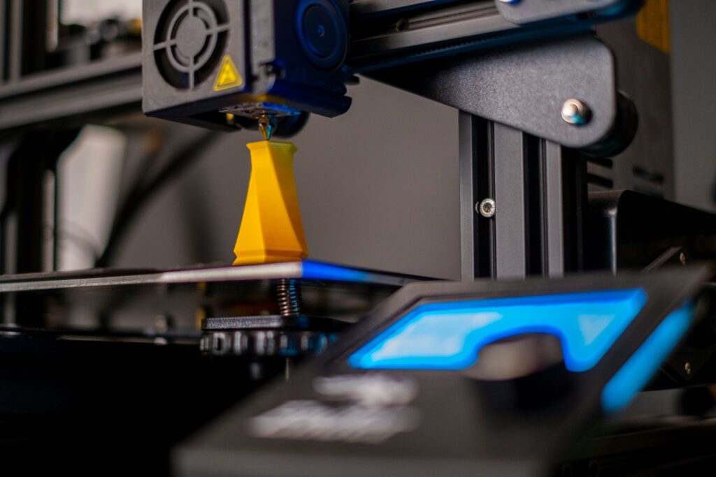 3d printing a yellow funnel.
